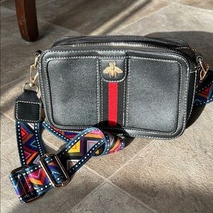 Black Crossbody Bag with Red Stripe & Gold Bee Accent